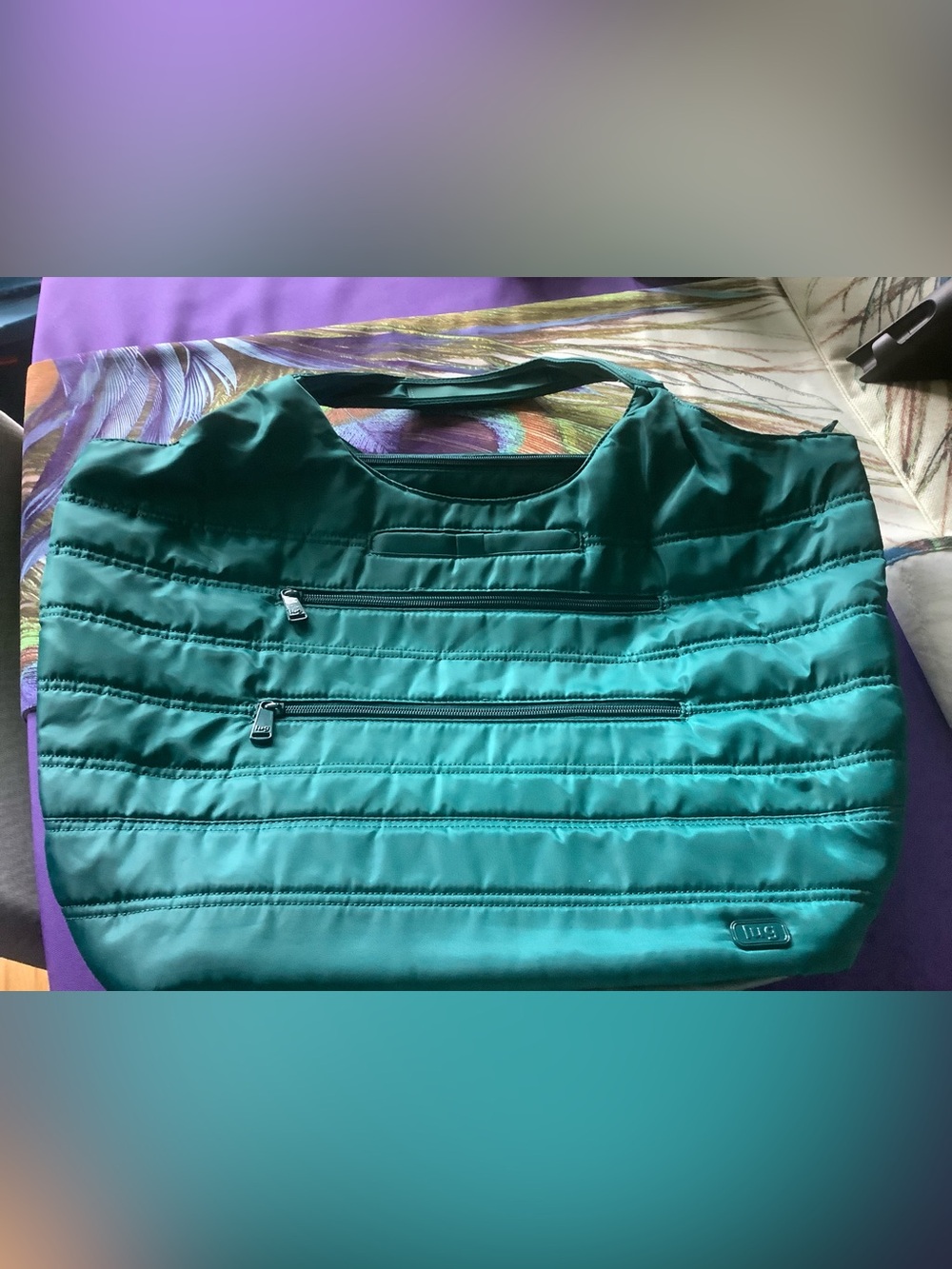 New without tags. Includes insulated pouch. Lug Teal Gondola XL